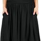 Flowing holiday skirt with a high waistband, ruffles and side pockets